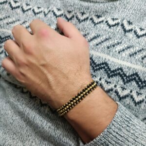 PULSERA CON BALINES LAMINADOS EN ORO 18K