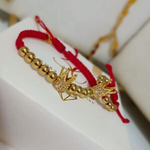 PULSERA CON BALINES LAMINADOS EN ORO 18K