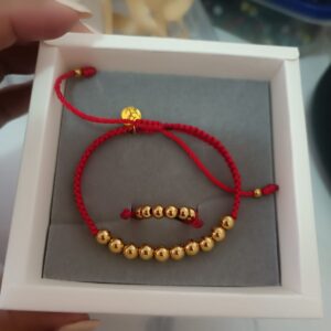 PULSERA CON BALINES LAMINADOS EN ORO 18K